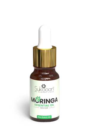 100% pure moringa essential oil in amber glass bottle with dropper, 10ml natural wellness product