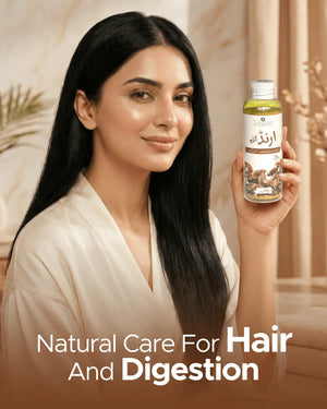Woman holding natural almond oil for hair and digestion care, wellness product