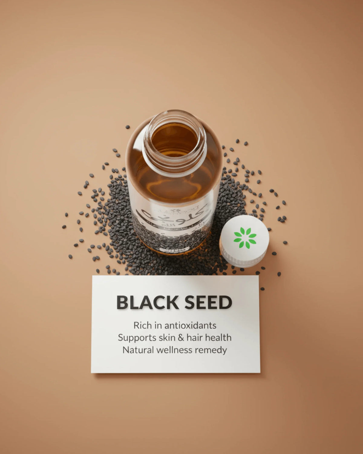 Black seed oil bottle with scattered seeds, rich in antioxidants for skin and hair wellness
