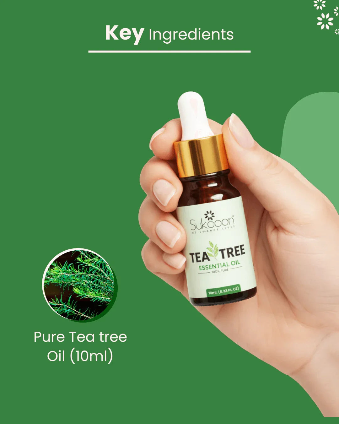 Hand holding 10ml bottle of pure tea tree essential oil with dropper, natural wellness ingredient